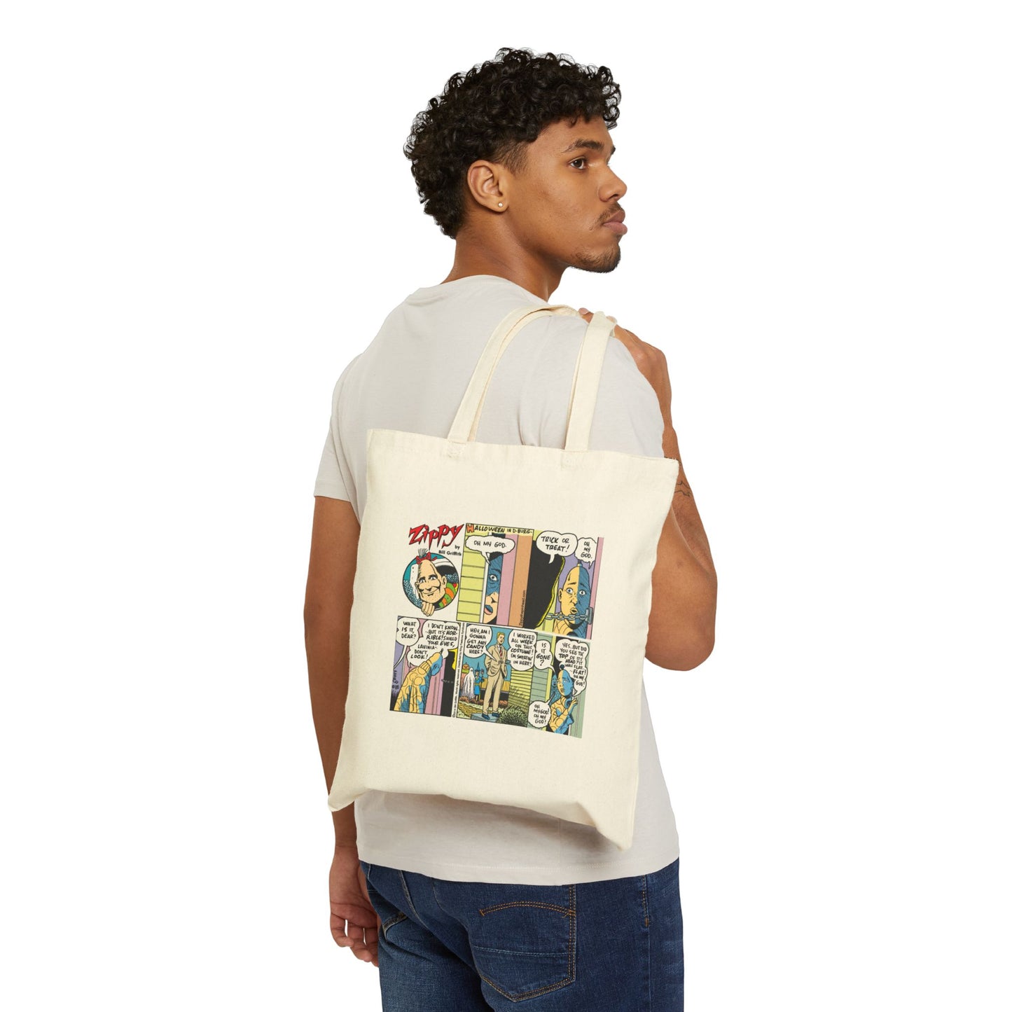 Man carrying a tote bag with comic book design on a white background