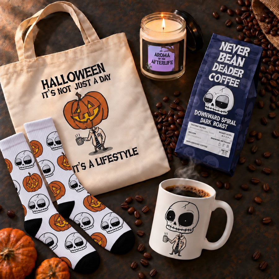 Never Been Deader coffee, mug, candle, tote and socks arranged on a dark table with coffee beans.
