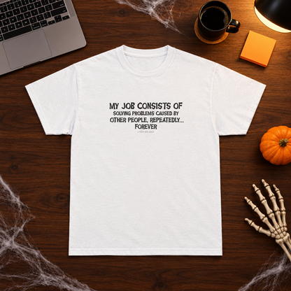 Never Been Deader "My Job Consists Of" white tee on an office desk with a laptop, coffee, sticky notes, a pumpkin and a skeleton hand.